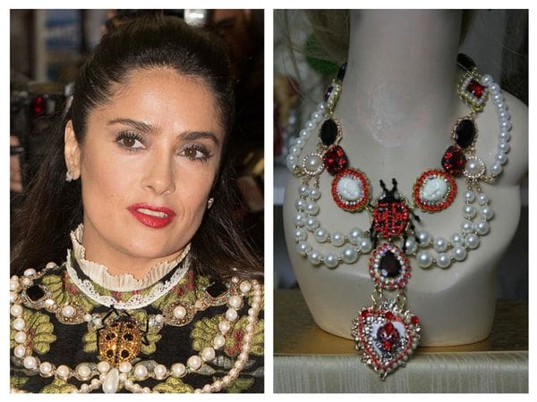 A woman wearing jewelry and a necklace