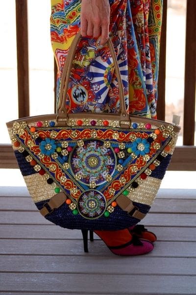 A colorful bag with many different colored beads.