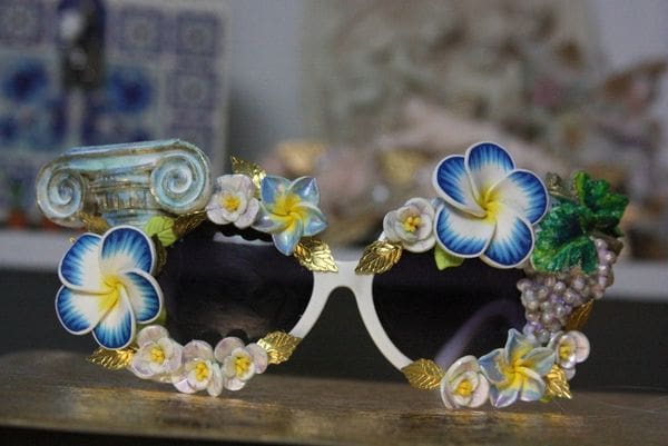 A pair of sunglasses with flowers on them.