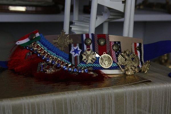 A table with medals and ribbons on it