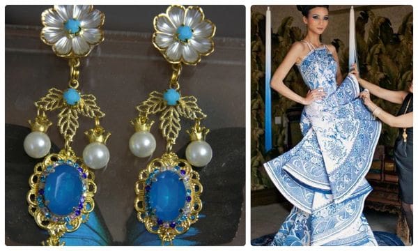 A woman in blue dress and earrings with pearls.