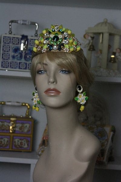 A mannequin wearing a tiara and earrings.