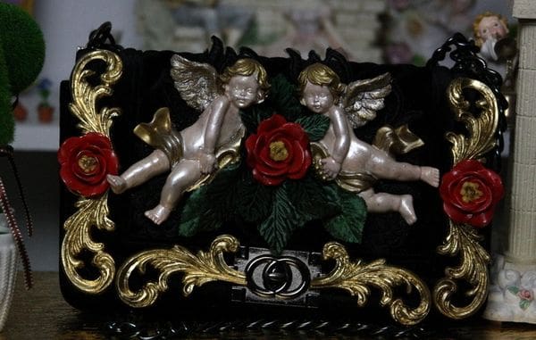 A close up of a bag with angels on it