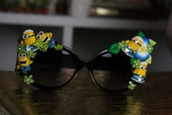 A pair of sunglasses with the minions on them.