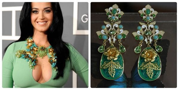 A woman wearing green and gold jewelry on the red carpet.