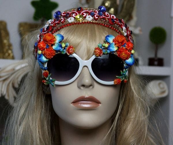 A mannequin wearing sunglasses and a headband.