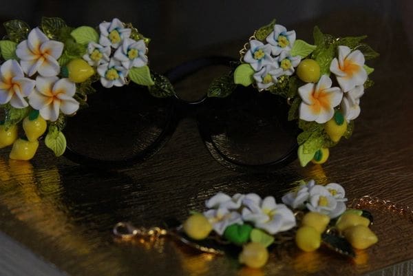 A pair of glasses with flowers on them