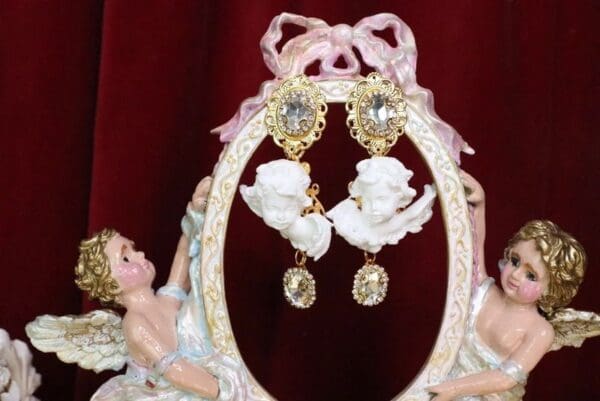SOLD! 5627 Runway Baroque Clear Rhinestone White Chubby Cherubs Earrings - Image 2