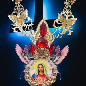 A necklace with an image of the virgin mary.