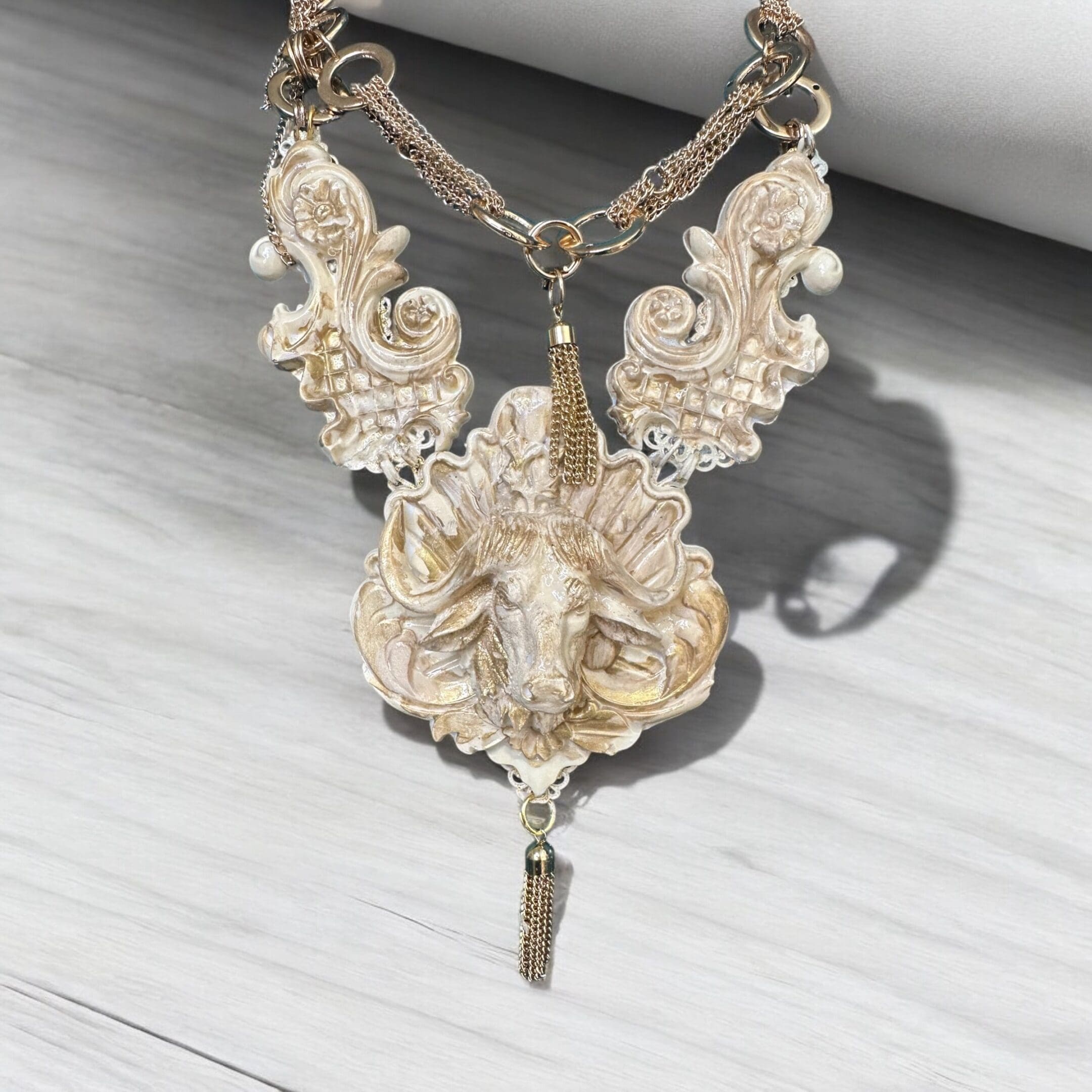 A necklace with an ornate design on it.