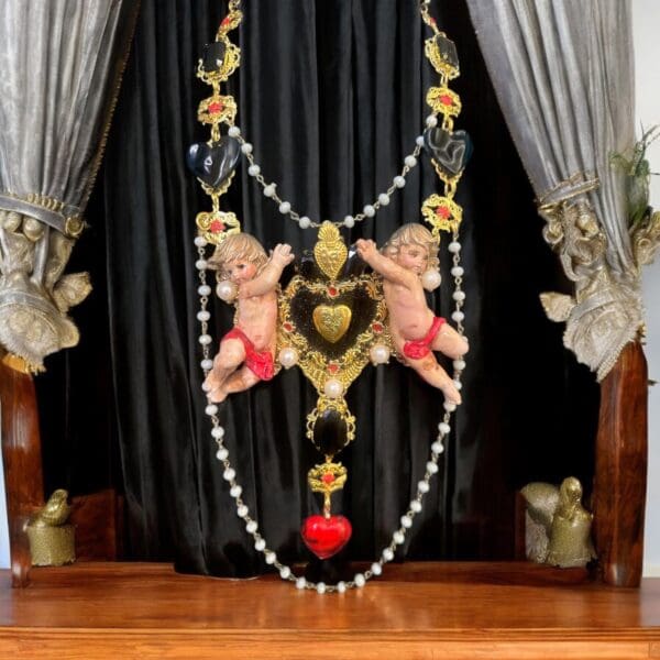 A table with curtains and a black curtain