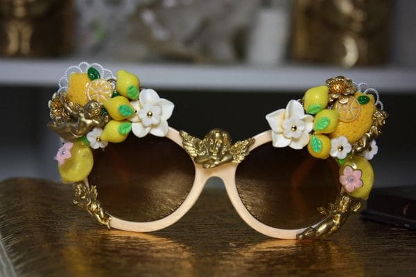 A pair of sunglasses with flowers on them.