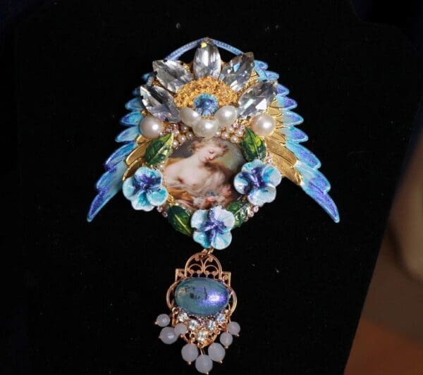 SOLD! 9961 Victorian Winged Flower Broocj